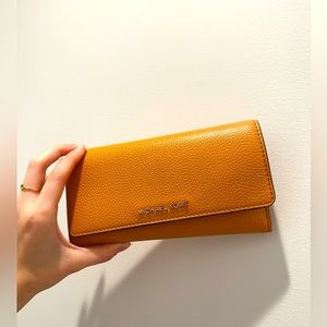 Micheal Kors large wallet; slightly used